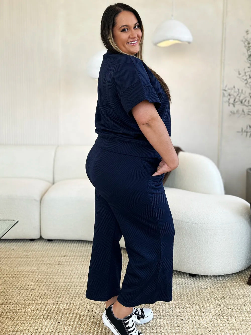 Trendsi Double Take full-size textured short sleeve top and matching pants set, casual stylish lounge wear, black and white pattern.
