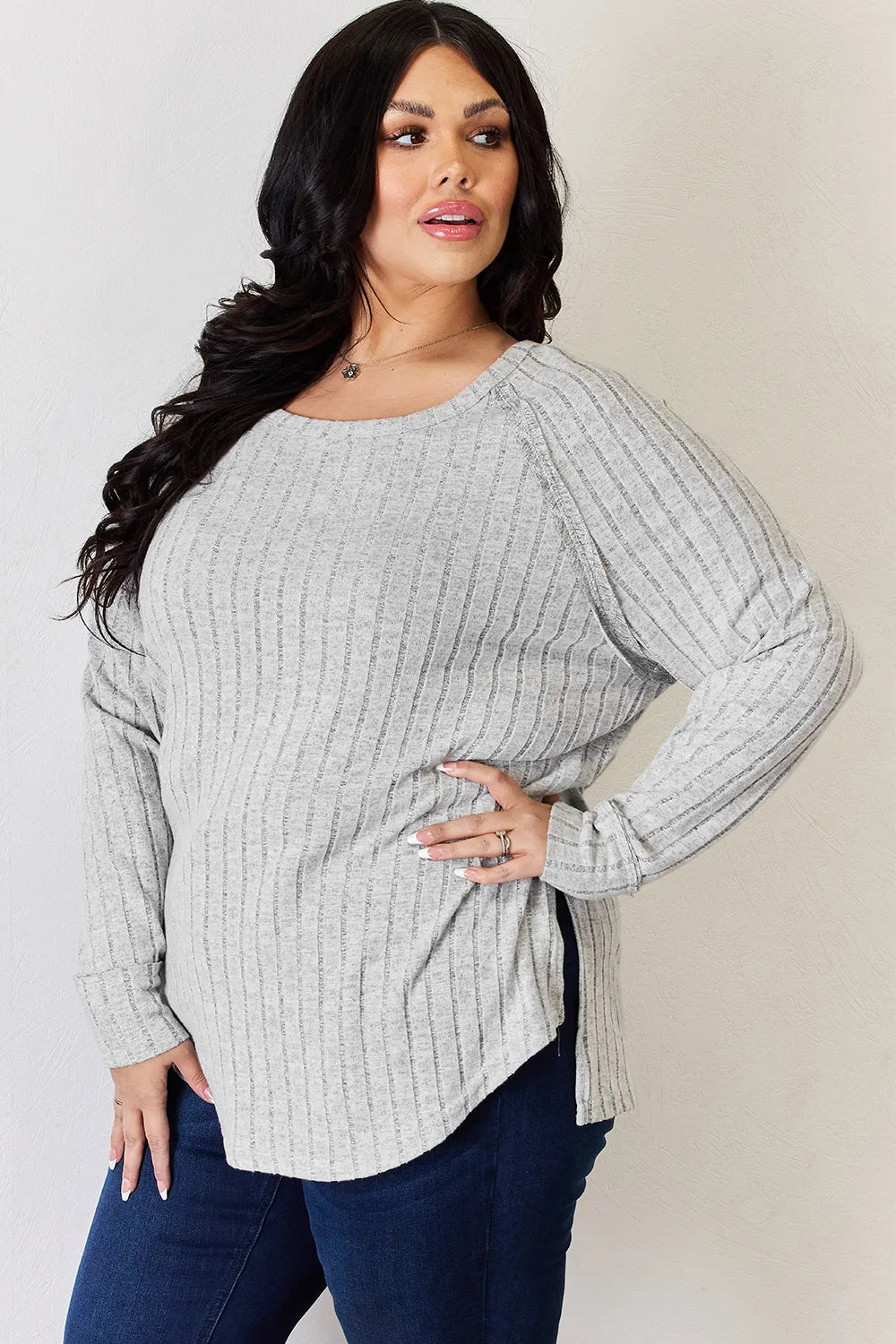 Trendsi Basic Bae ribbed round neck slit T-shirt in full size, featuring a classic fit with ribbed fabric and a stylish side slit.