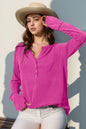 Long sleeve T-shirt by Trendsi with notched thumbhole design, featuring a relaxed fit and casual style.