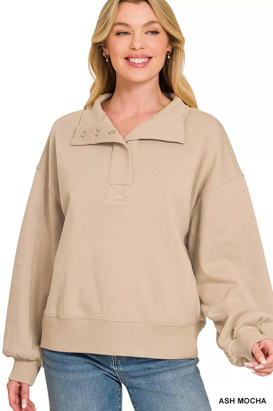Gray Zenana fleece half snap button sweatshirt with a relaxed fit and front snap closure, shown on a model.