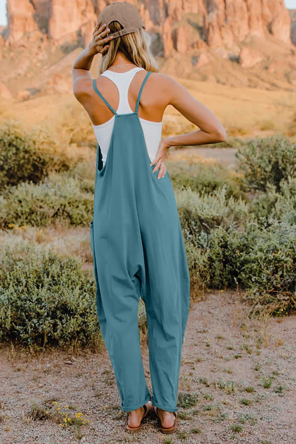 Trendsi Double Take full-size sleeveless V-neck jumpsuit with pockets, stylish and comfortable women's one-piece outfit.