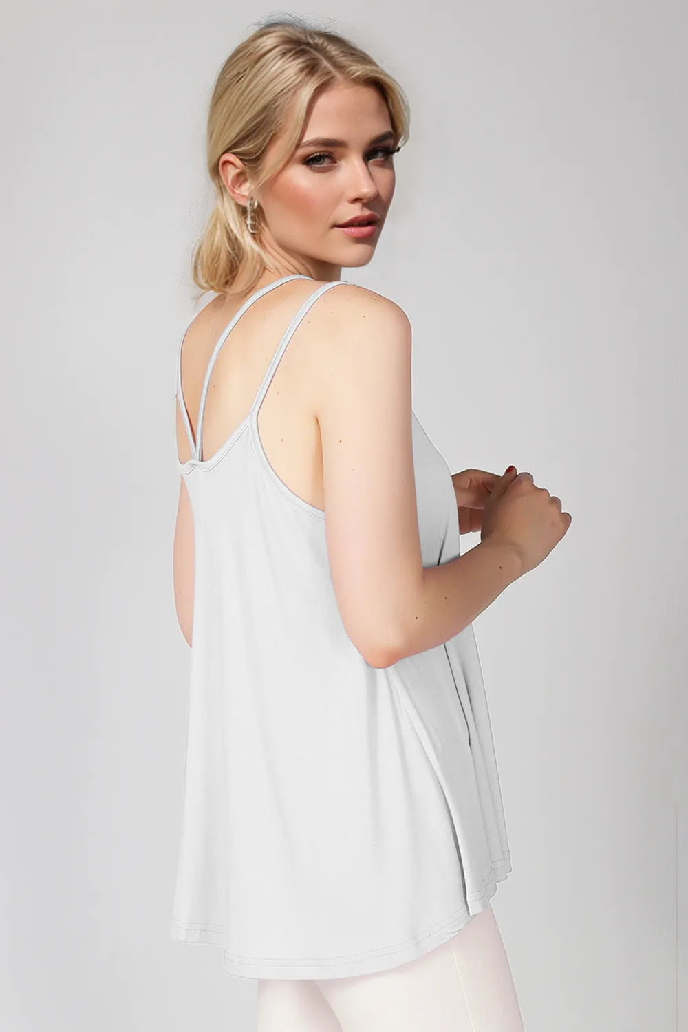 Basic Bae bamboo camisole by Trendsi featuring scoop neck, double spaghetti straps, and soft bamboo fabric in natural light.