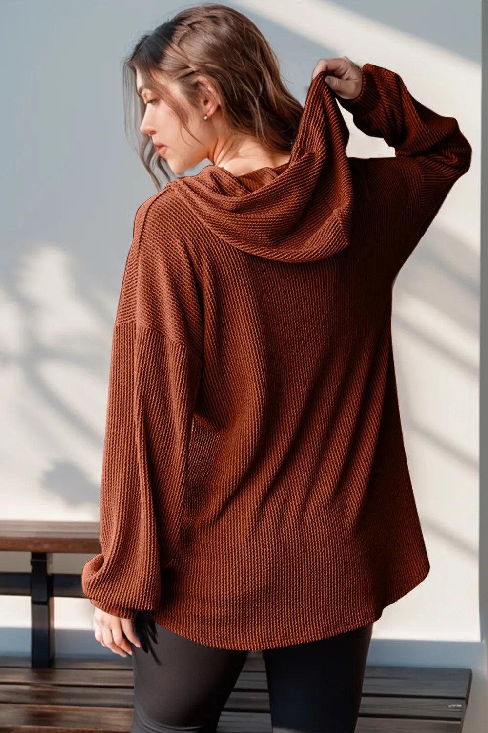 Long sleeve hoodie from Trendsi's Double Take collection, featuring a full-size half button design and casual fit.