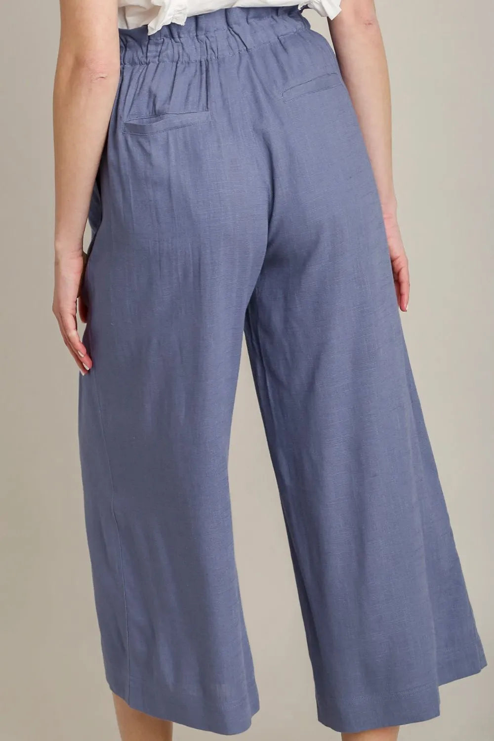 Plus size linen wide fit pants with drawstring from Umgee, featuring a relaxed style and full-length design.