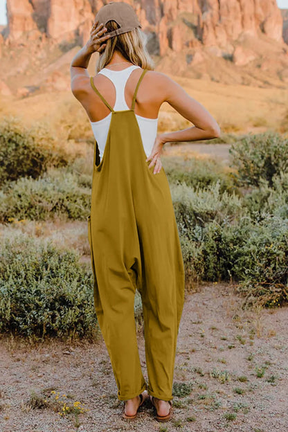Trendsi Double Take full size sleeveless V-neck jumpsuit with pockets, shown in black fabric on a mannequin.