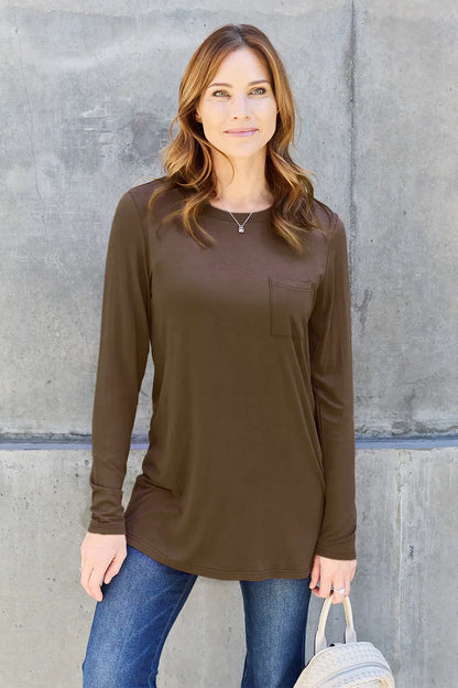 Long sleeve round neck top from Basic Bae by Trendsi, made of soft fabric, in a full size, showing the front view.
