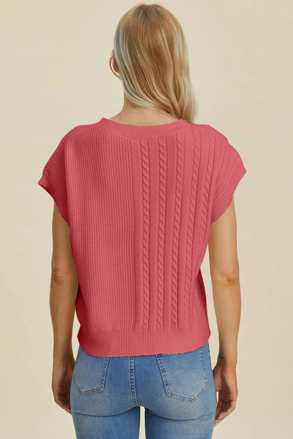 Plus size cable-knit round neck short sleeve sweater by Trendsi, featuring a cozy, stylish full-size cable-knit design.