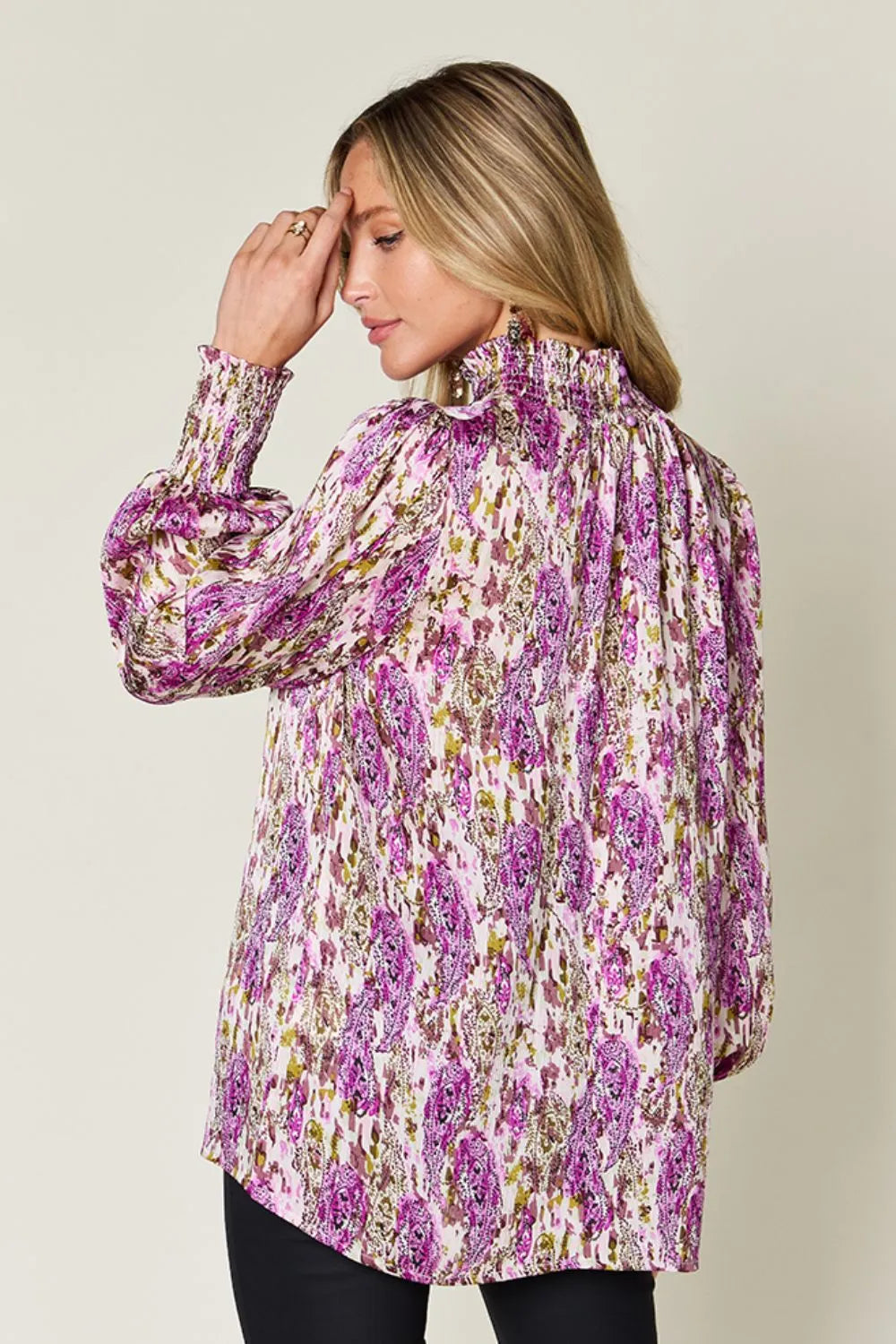 Printed smocked long sleeve blouse from Trendsi, featuring a double take full size design with intricate pattern and comfortable fit.