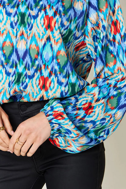 Printed balloon sleeve blouse by Trendsi featuring double take full size design with bold balloon sleeves and stylish print fabric.