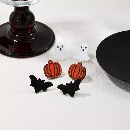 Set of three Halloween-themed stud earrings featuring spooky designs, perfect for festive accessories and stylish costume jewelry.