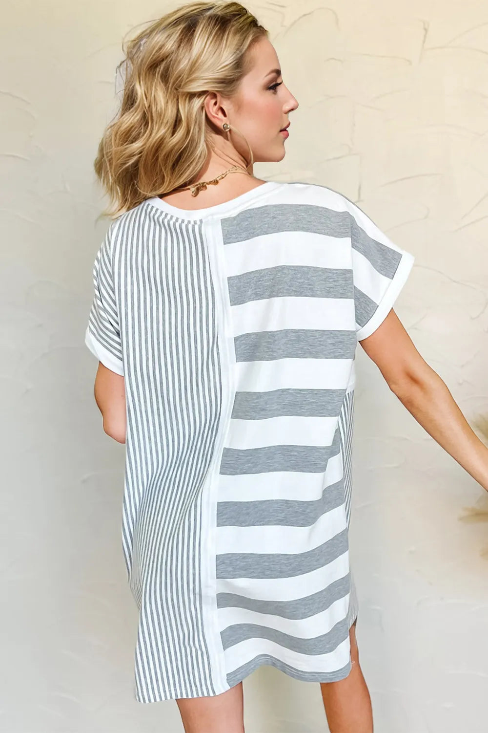 Striped mini tee dress with round neckline and short sleeves from Trendsi, casual and stylish for everyday wear.