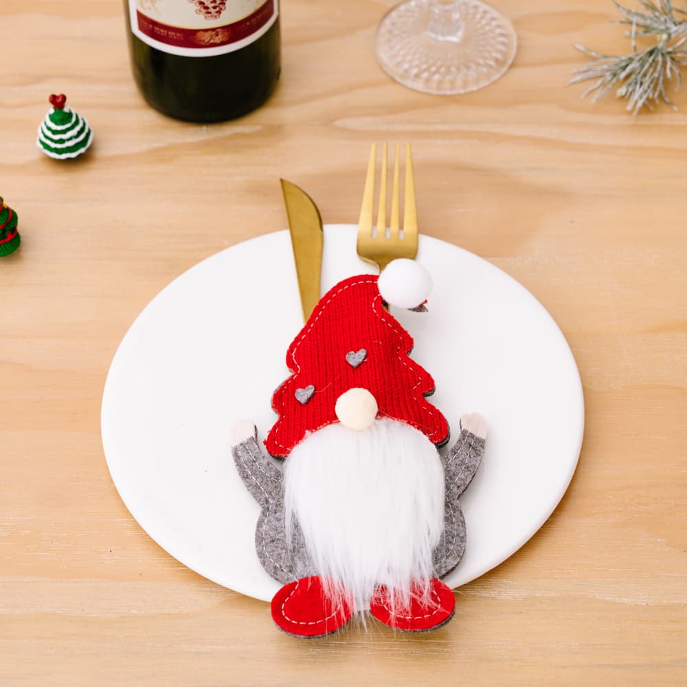 Faceless gnome cutlery holders set with three whimsical ceramic gnome figures for kitchen organization and decor.