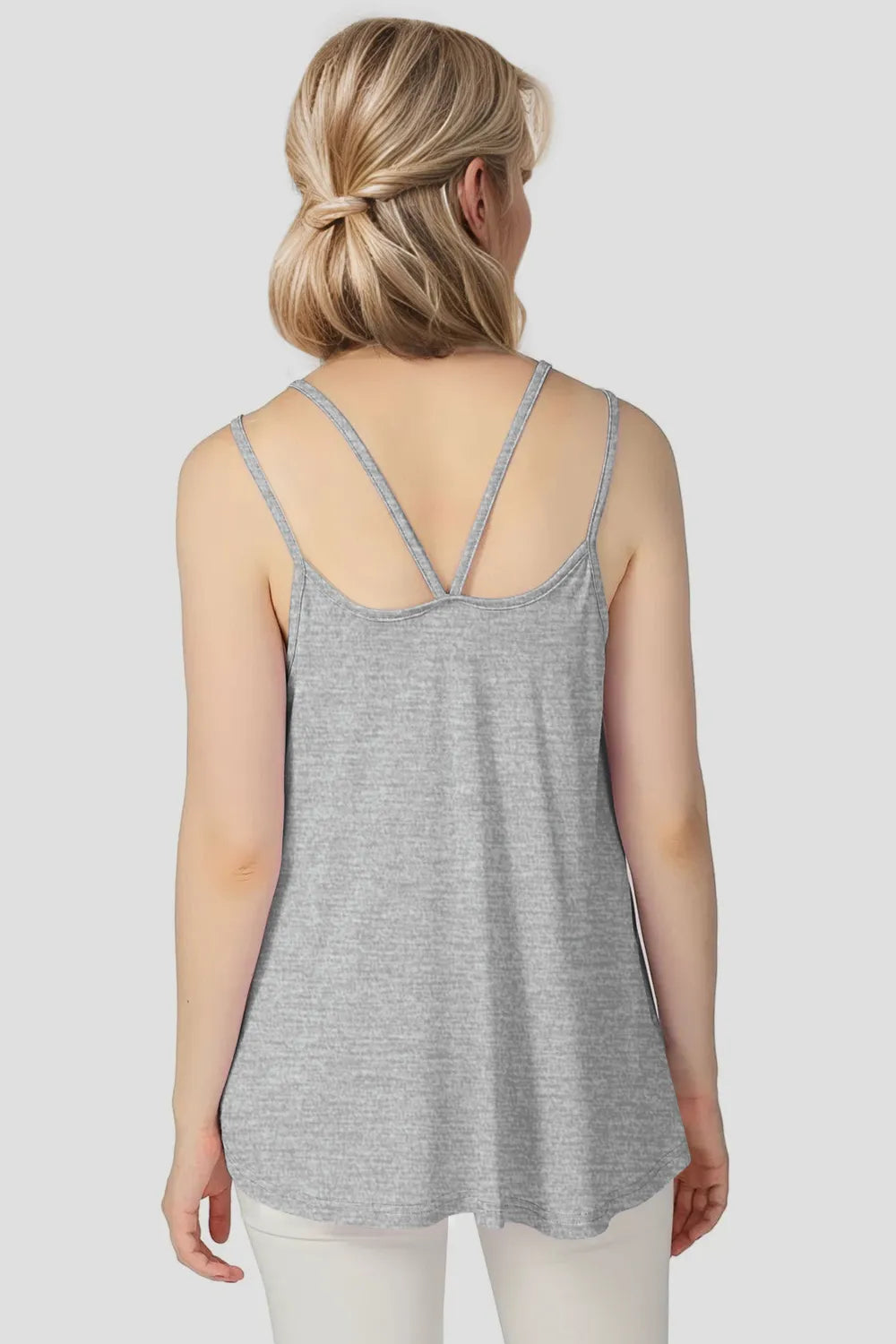 Trendsi Basic Bae bamboo scoop neck camisole with double spaghetti straps, soft and lightweight, in a neutral color.