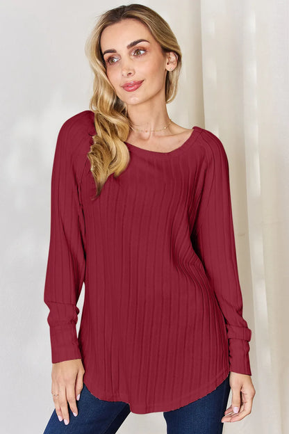 Basic Bae full-size ribbed round neck slit T-shirt by Trendsi, featuring a comfortable ribbed fabric and stylish slit detail.