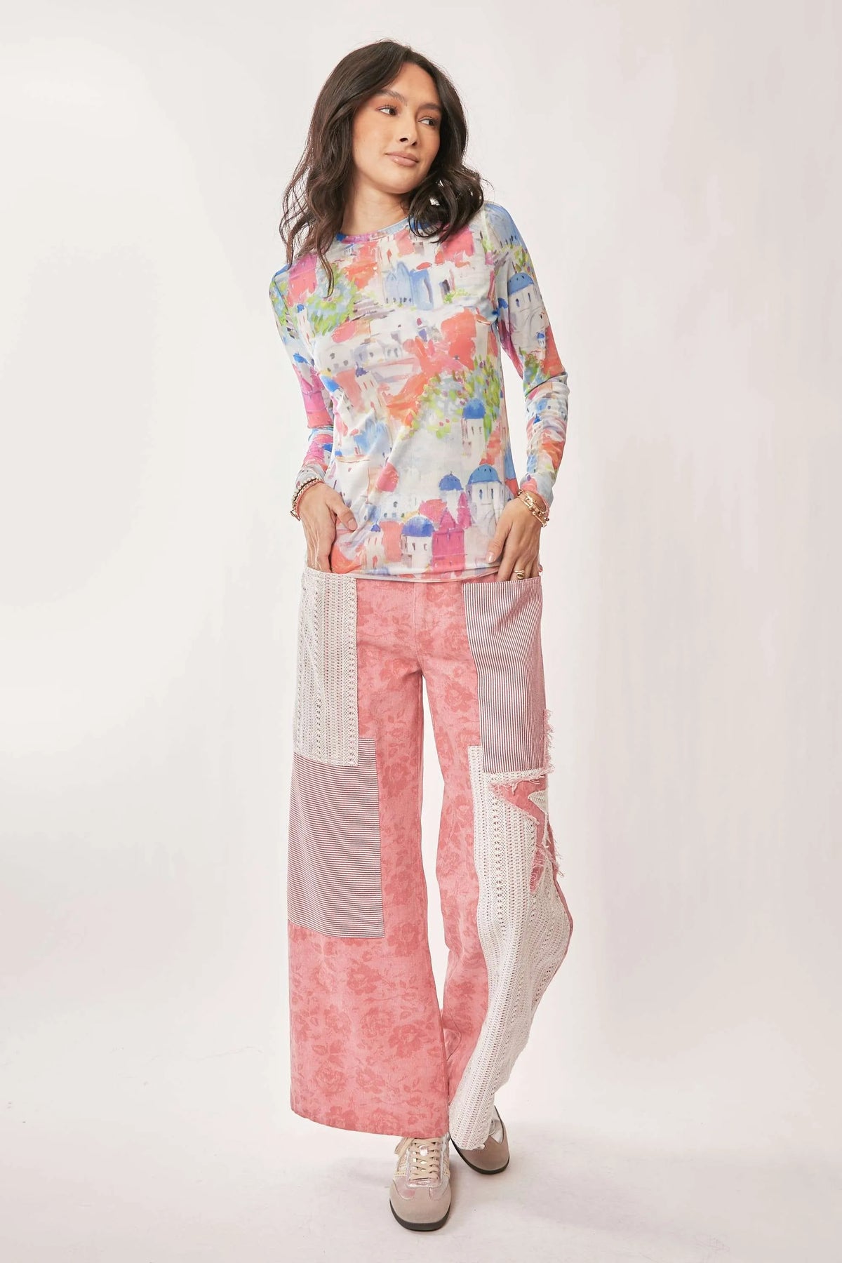 Davi & Dani multi-printed mesh long sleeve round neck top with colorful patterns and lightweight fabric.