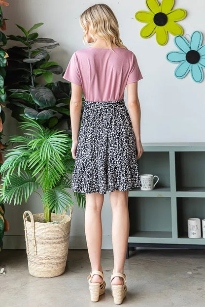 Heimish plus size mini dress featuring short sleeves with solid and animal print patterns, stylish and comfortable for casual wear.
