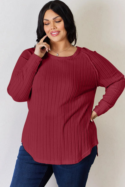 Basic Bae full size ribbed round neck slit T-shirt by Trendsi, shown in beige with ribbed fabric and a relaxed fit.