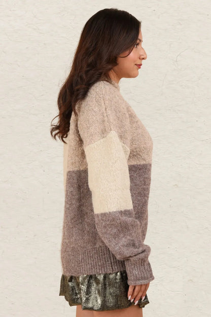 Color block mock neck drop shoulder sweater by Trendsi, featuring a stylish design with contrasting color blocks and a cozy fit.