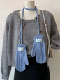 Cable knitted mittens with neck strap from Trendsi, featuring a cozy textured knit and a secure strap for warm winter wear.