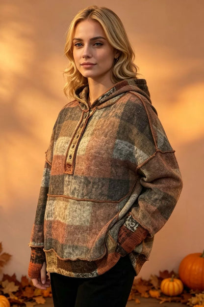 Plus size plaid fleece hoodie with dropped shoulders and double take full size fit, featuring a cozy fleece material and relaxed style.