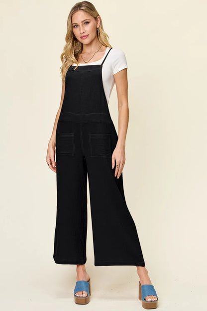 Trendsi Double Take full size texture sleeveless wide-leg overall, showing its relaxed fit and stylish fabric detail.