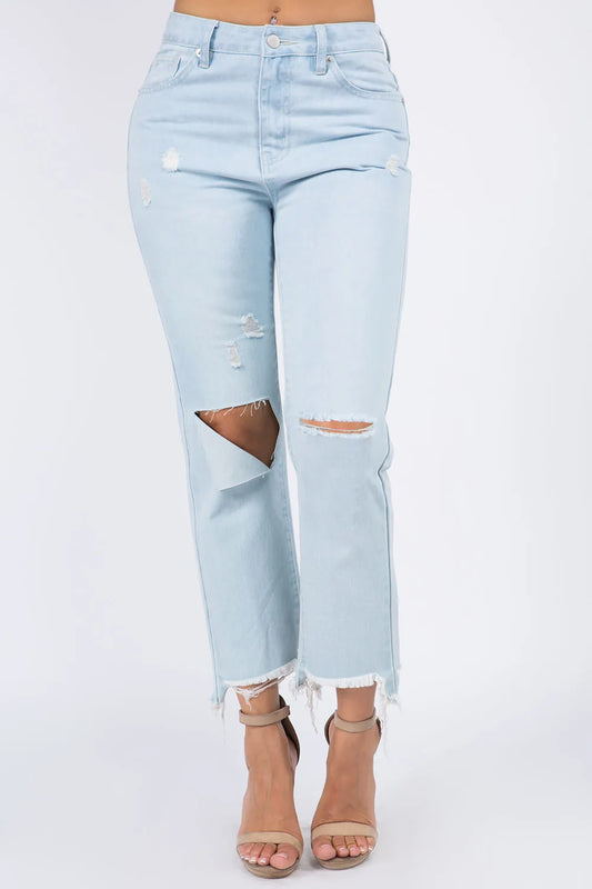 American Bazi high waist distressed raw hem jeans by Trendsi, showcasing a fitted denim style with frayed edges and distressed details.