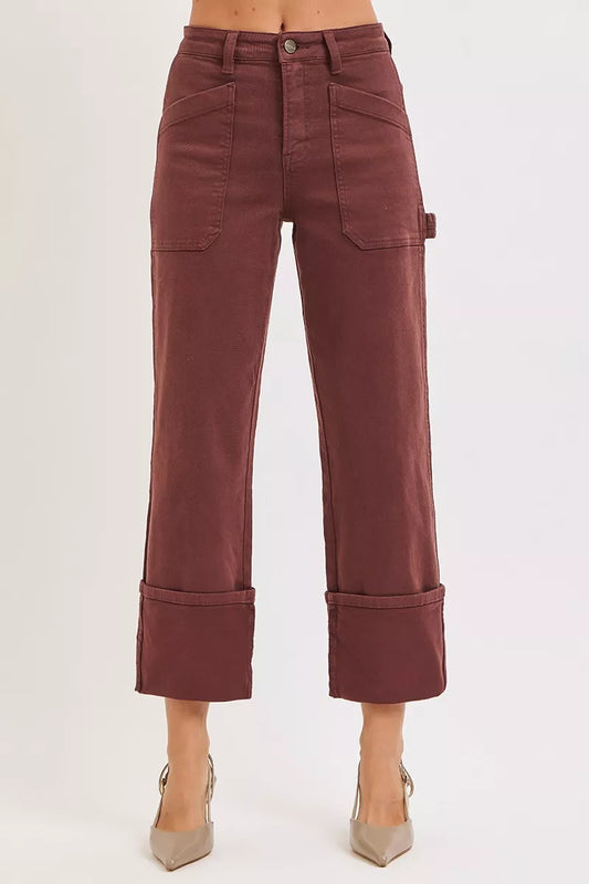 Plus size high rise wide straight cuffed patch jeans from RISEN by Trendsi, showing the denim's fit and stylish patch details.