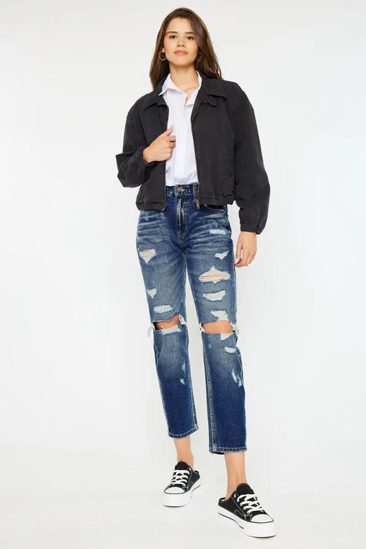 Kancan high rise distressed mom fit jeans in blue denim, showing front view with rips and frayed details.