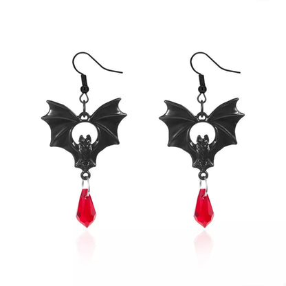 Gothic bat drop earrings with dark metal finish and intricate bat wing design, hanging from hooks for a bold, edgy look.