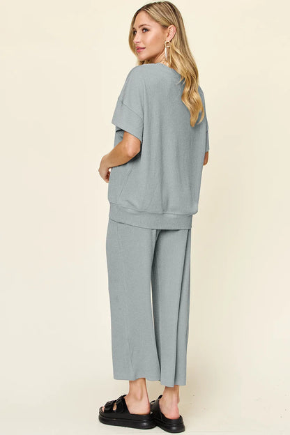 Trendsi double take full size textured round neck short sleeve T-shirt with wide-leg pants, showcasing casual stylish outfit.