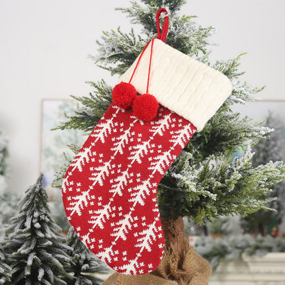 Red Christmas stocking hanging widget with decorative trim, designed for festive holiday decor by Trendsi.