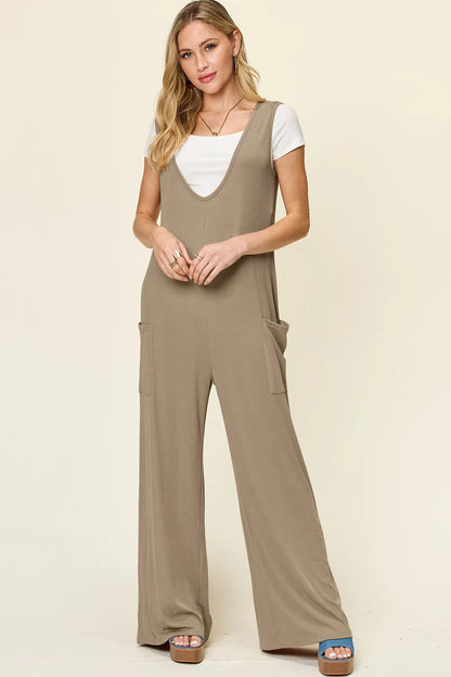 Plus size Trendsi double take sleeveless wide-leg jumpsuit with pockets, full length, and comfortable fit.