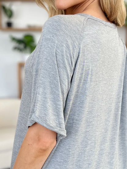 Trendsi Basic Bae full-size bamboo V-neck short sleeve T-shirt with slit detail, soft fabric, and casual fit.