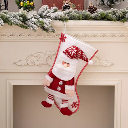 Red Christmas stocking hanging widget from Trendsi with festive design, ideal for holiday decor and seasonal decoration.