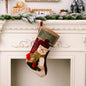 Red Christmas stocking hanging with decorative widget, featuring festive holiday design, from Trendsi's Merry Christmas Stocking collection.