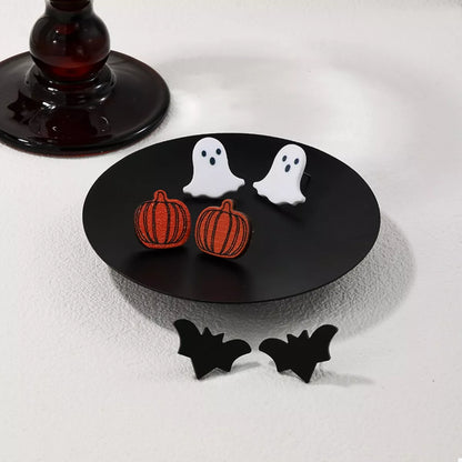 Three Halloween-themed stud earrings featuring spooky designs, perfect for festive accessories and costume jewelry.