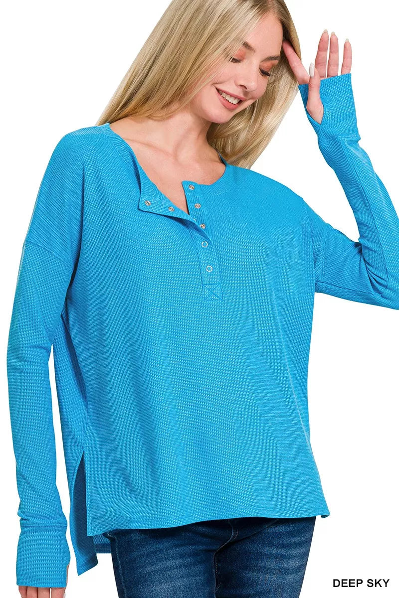 Zenana waffle henley tee with thumb hole cuffs, featuring a henley neckline and casual waffle knit fabric.