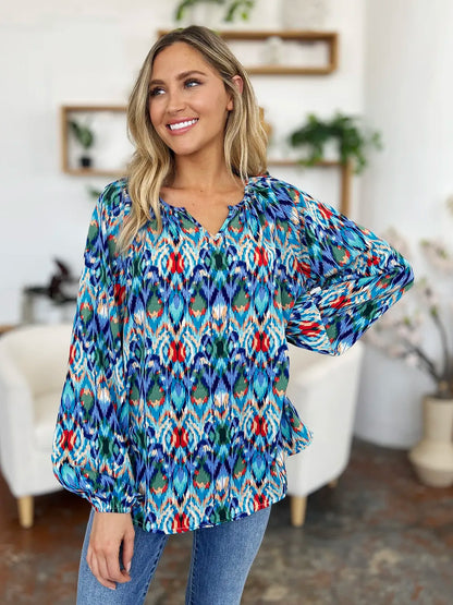 Printed balloon sleeve blouse from Trendsi featuring a double take full size design and stylish balloon sleeves.