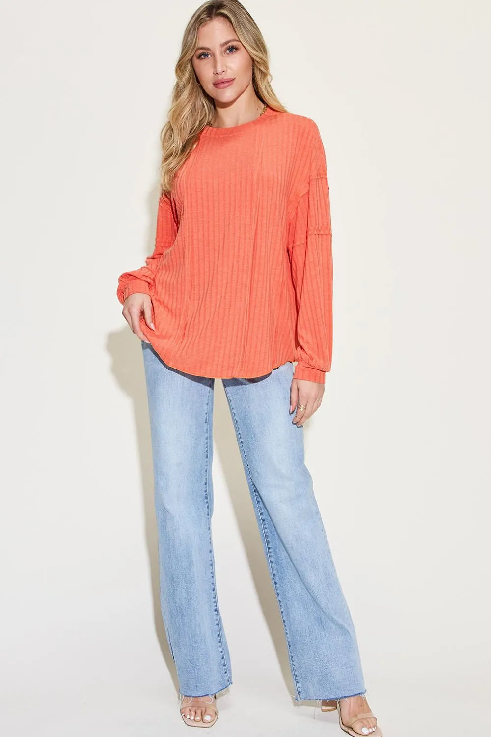 Trendsi Basic Bae full-size ribbed round neck long sleeve T-shirt in neutral color, showcasing its ribbed texture and classic fit.