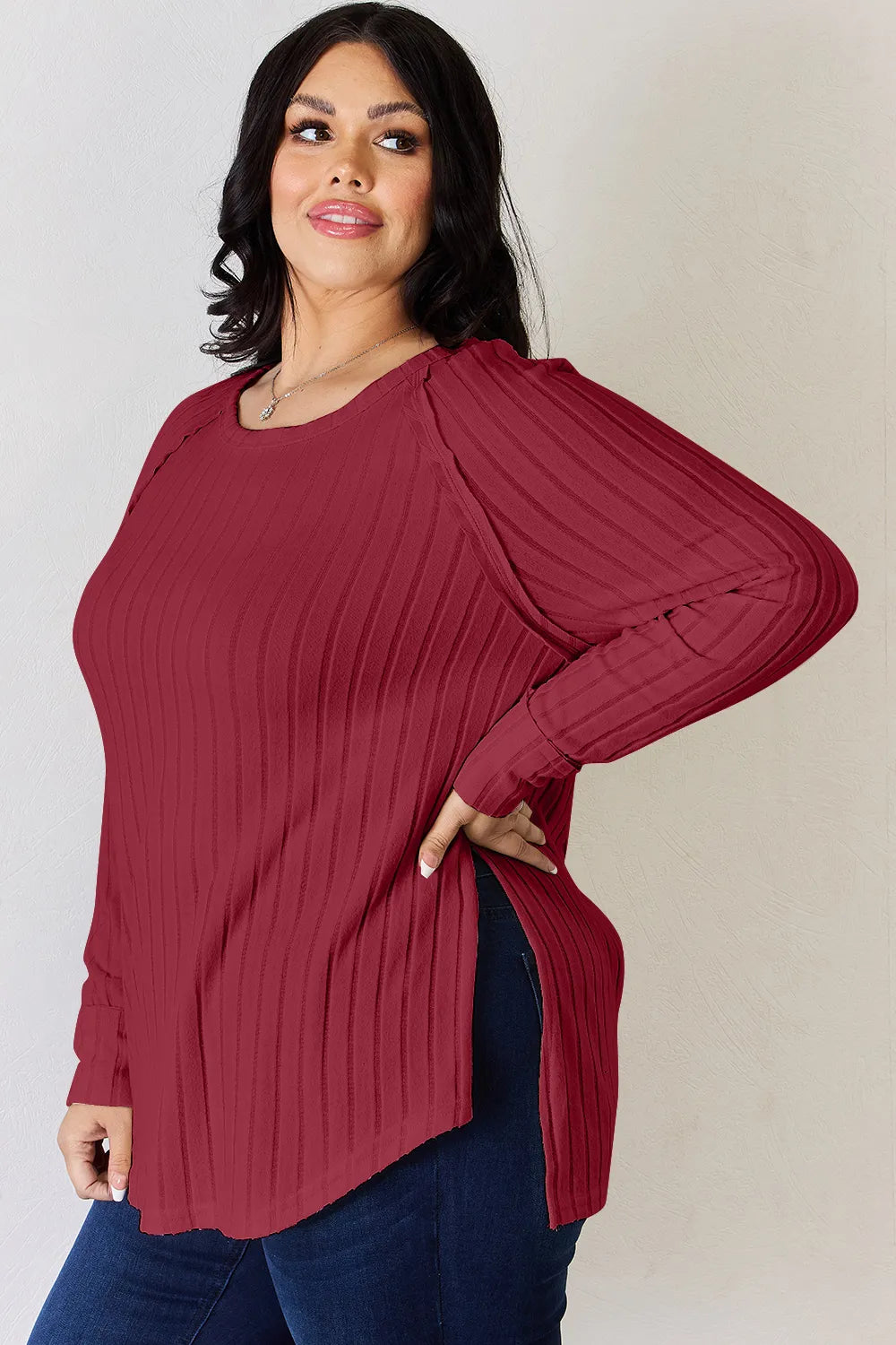 Basic Bae full-size ribbed round neck slit T-shirt by Trendsi, showing a close-up of the ribbed fabric and slit design.