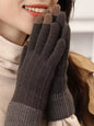 Warm knitted touchscreen gloves by Trendsi featuring soft fabric and ribbed cuffs, designed for cold weather and smartphone use.