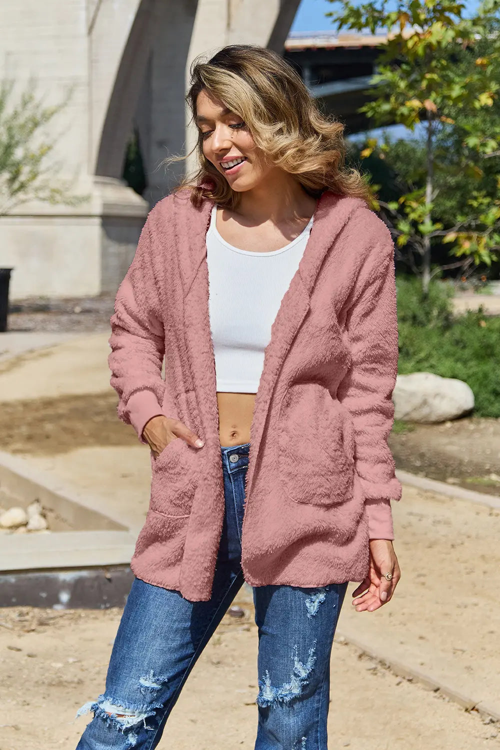 Full size Teddy hooded jacket with pockets by Trendsi, featuring soft plush fabric and a cozy hood for warmth and style.