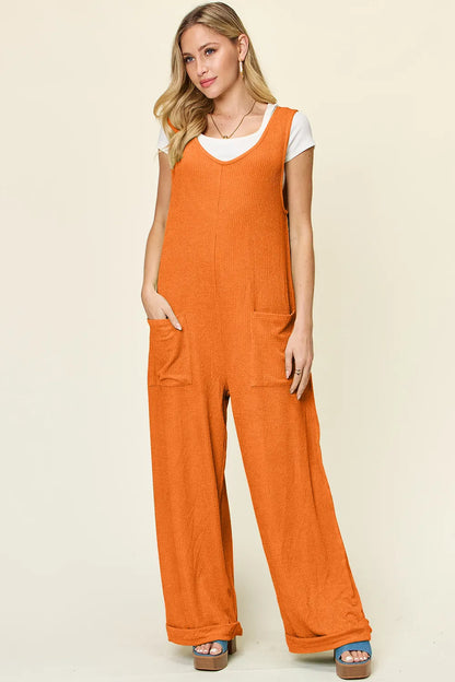 Full view of Trendsi Double Take texture sleeveless wide-leg jumpsuit in a full size, showcasing its relaxed fit and stylish design.