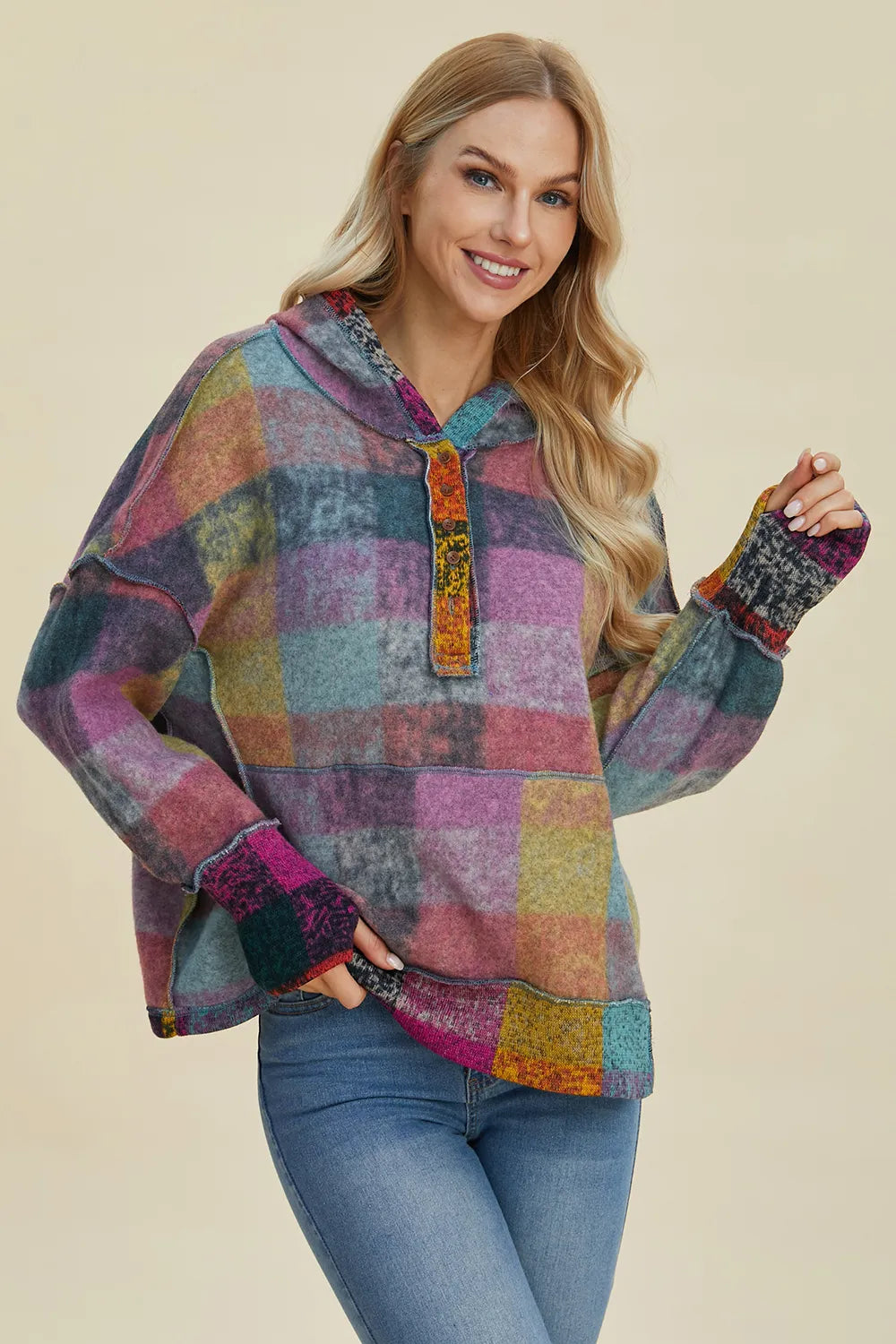 Plus size plaid fleece hoodie with dropped shoulders from Trendsi, featuring a cozy, oversized fit and a stylish double take design.