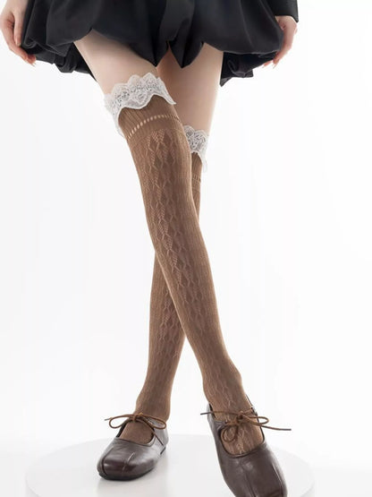 Lace over-the-knee hollow-out stockings by Trendsi featuring intricate lace design and sheer fabric, perfect for stylish legwear.