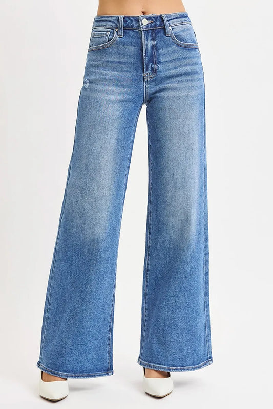 Plus size RISEN high rise wide leg jeans from Trendsi, showcasing the full-length denim with a relaxed fit and stylish wide legs.