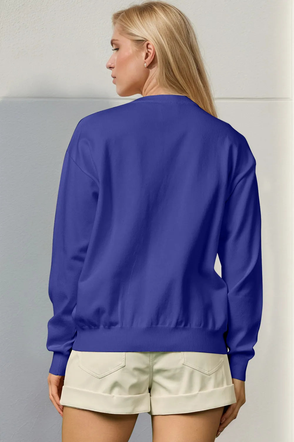 Trendsi Double Take full size sequin Nutcracker long sleeve sweater with festive holiday design and colorful sequin details.