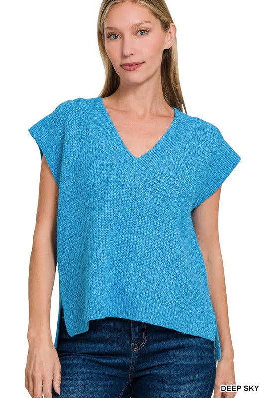 Zenana oversized sweater vest with side slit, cozy knit, and relaxed fit, ideal for layered fall and winter outfits.