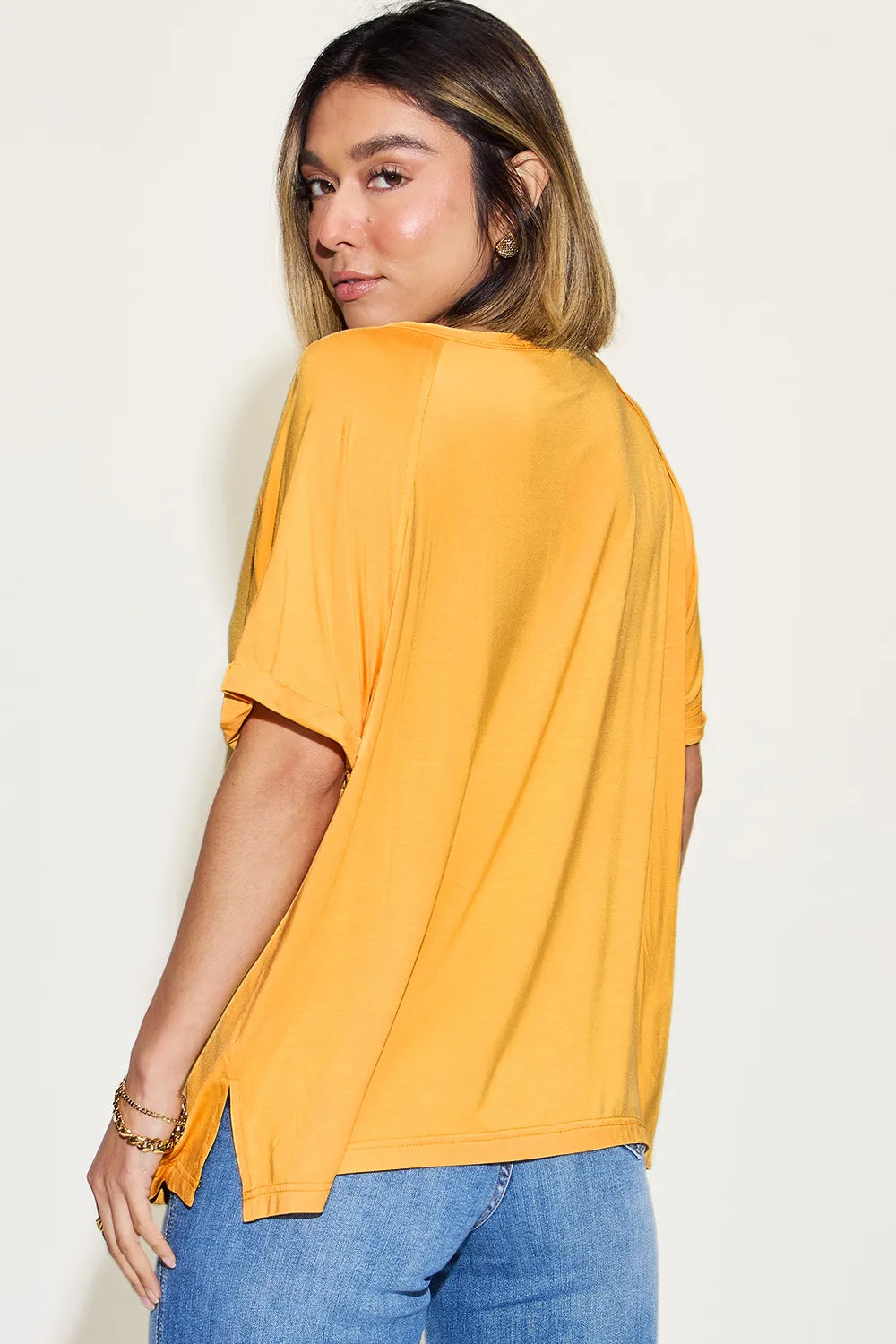 Basic Bae bamboo V-neck T-shirt by Trendsi, showing a full-size short sleeve shirt with a slit V-neck in natural bamboo fabric.