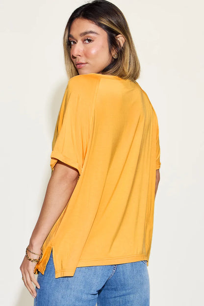 Basic Bae bamboo V-neck T-shirt by Trendsi, showing a full-size short sleeve shirt with a slit V-neck in natural bamboo fabric.